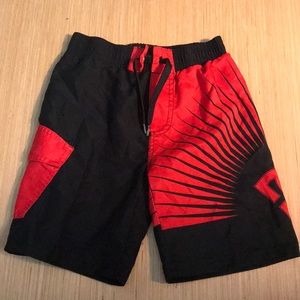 Boys red and black DCshoes swimming trunks
